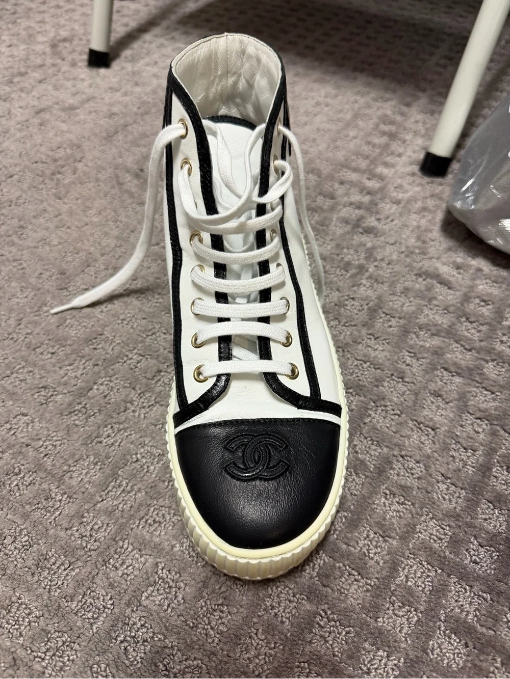 CHANEL White and Black High-Top Logo Sneaker